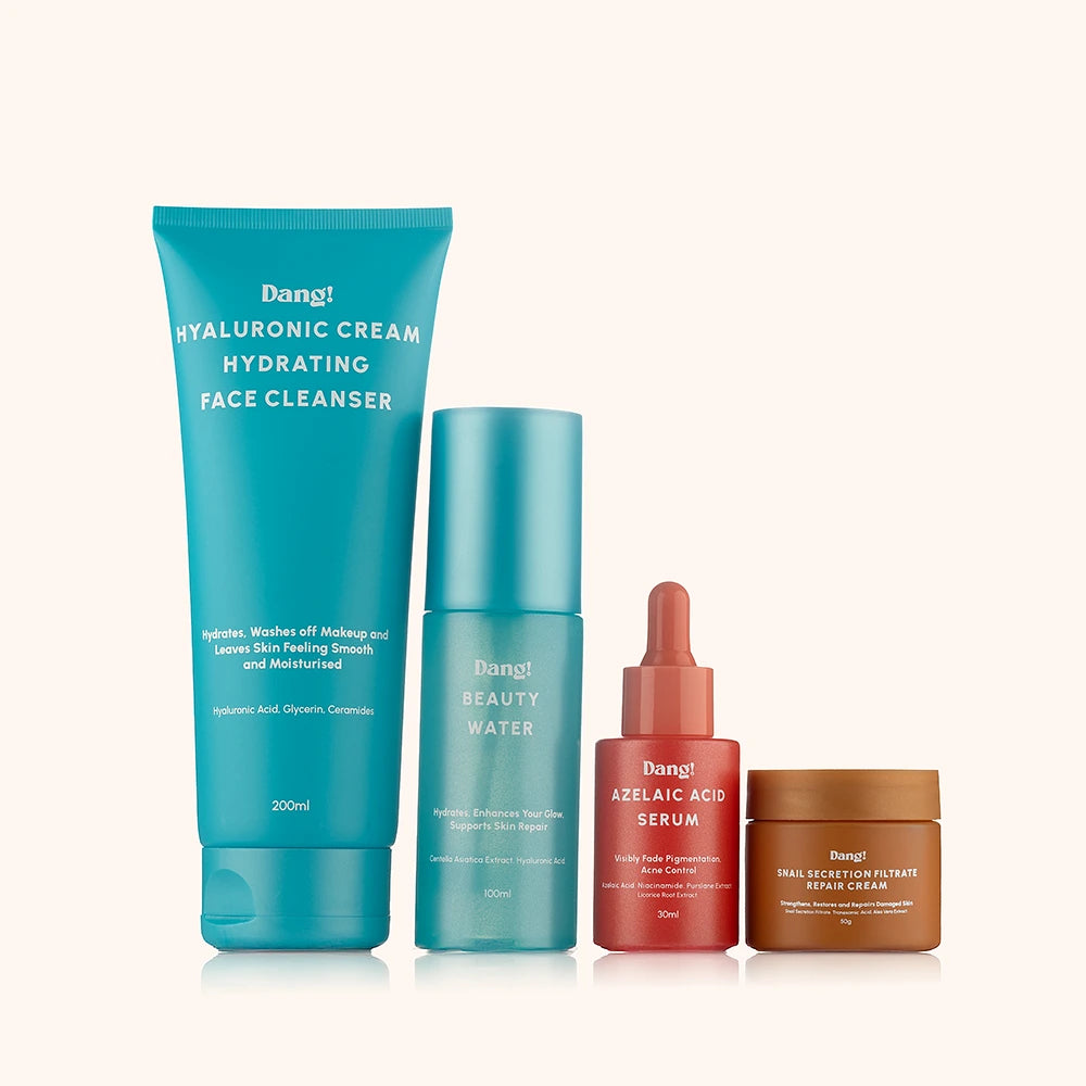 An image of 4 bottles of skincare products lined up against a white background