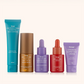 Set of skincare products with colorful packaging on a white background