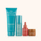 An image of 4 bottles of skincare products lined up against a white background