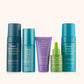 Different bottles of skincare products for beginners with different colours against a white background