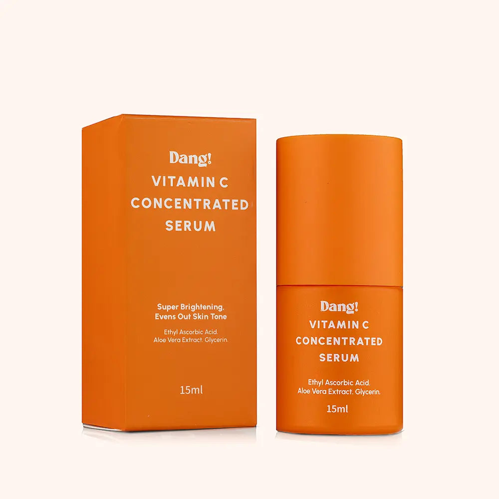 An image of a product in an orange bottle with the text Dang! Vitamin C concenterated serum in white colour